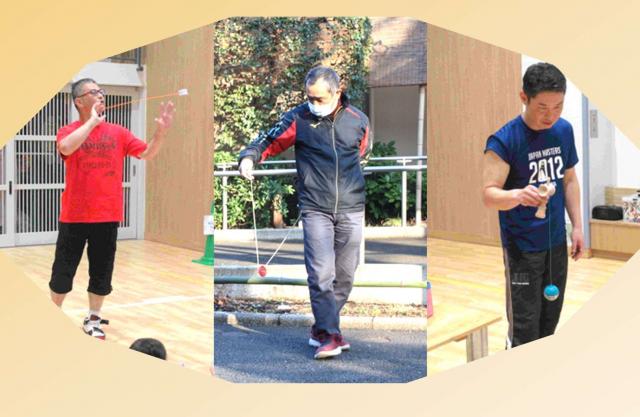 画像：左からヨーヨー名人、こま名人、けん玉名人が並んだ写真